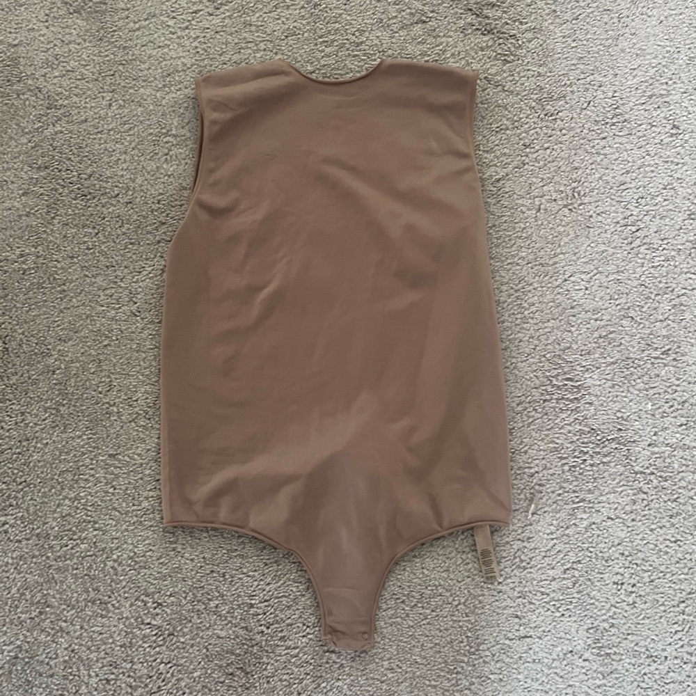 Skims body suit large/XL